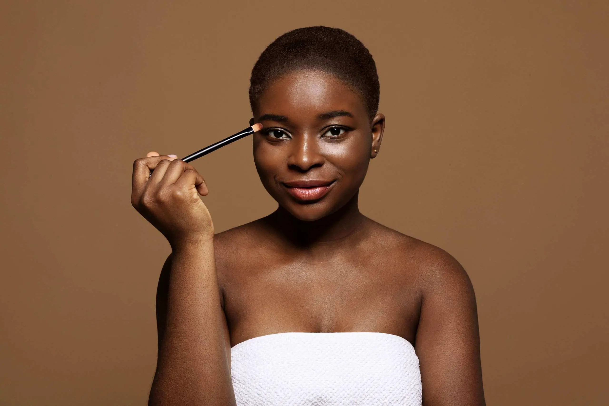 Black Women putting on make up