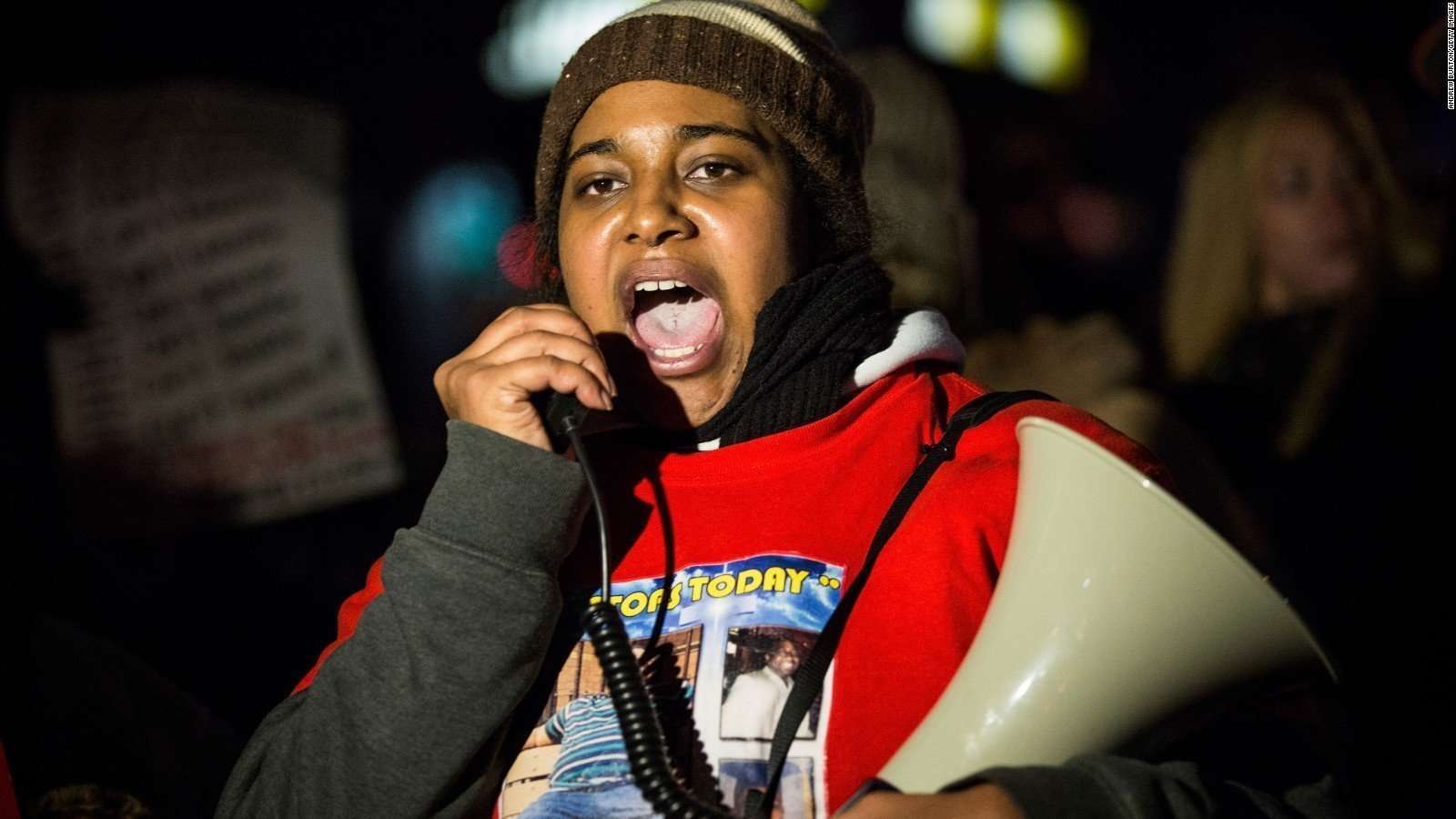 Black protestor screaming from erica garner,