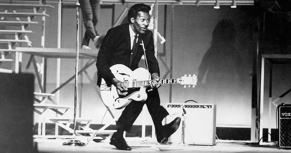chuck berry live on stage playing his quarter