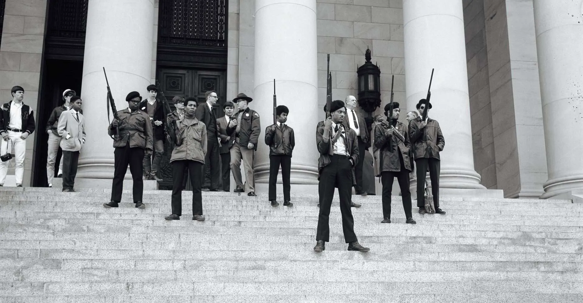 Black Panthers standing with Guns on the capital in Sacramento, Ronald Regan