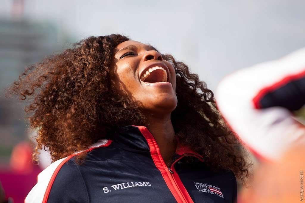 Serena williams screaming in the air with joy