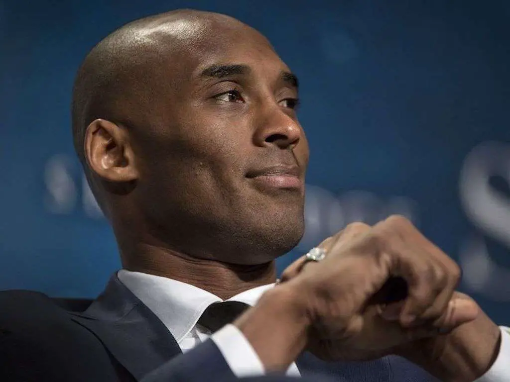 Kobe Bryant in suit as a business man