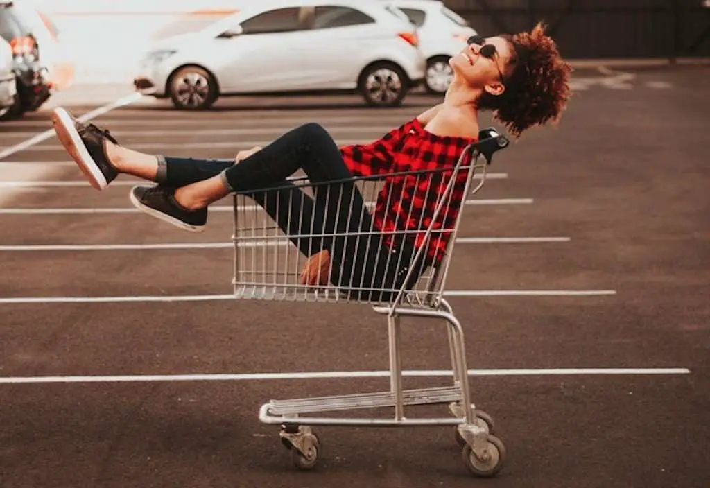 Happy Black Girl in a shopping cart