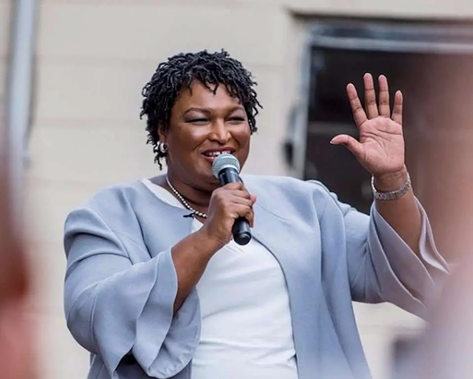 Stacey Abrams on the campaign trail, blue shirt