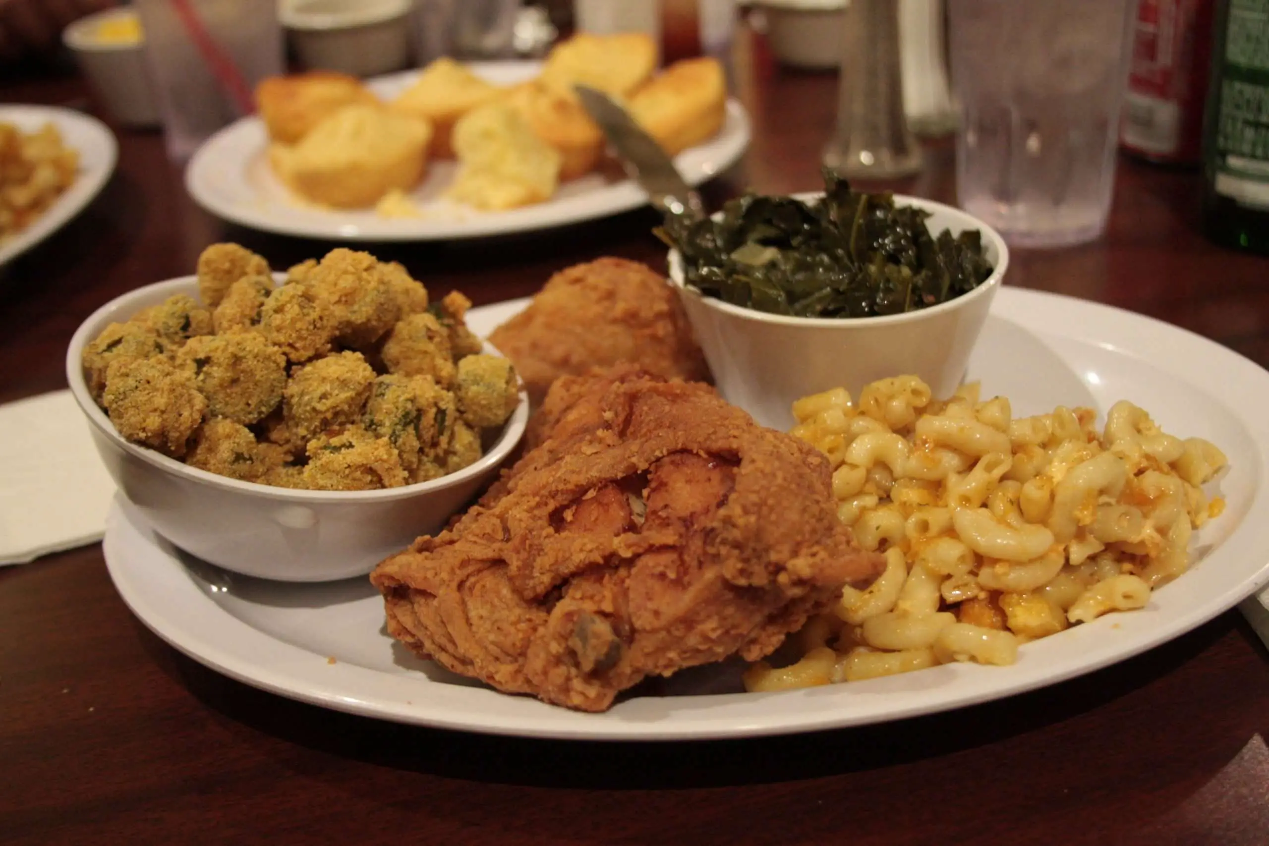 Picture of soul food with Fried Chicken with greens and Mac and cheese