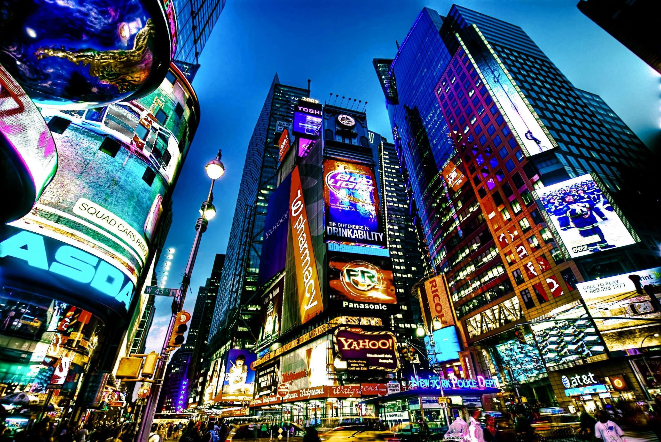 New York at night looking up at buildings