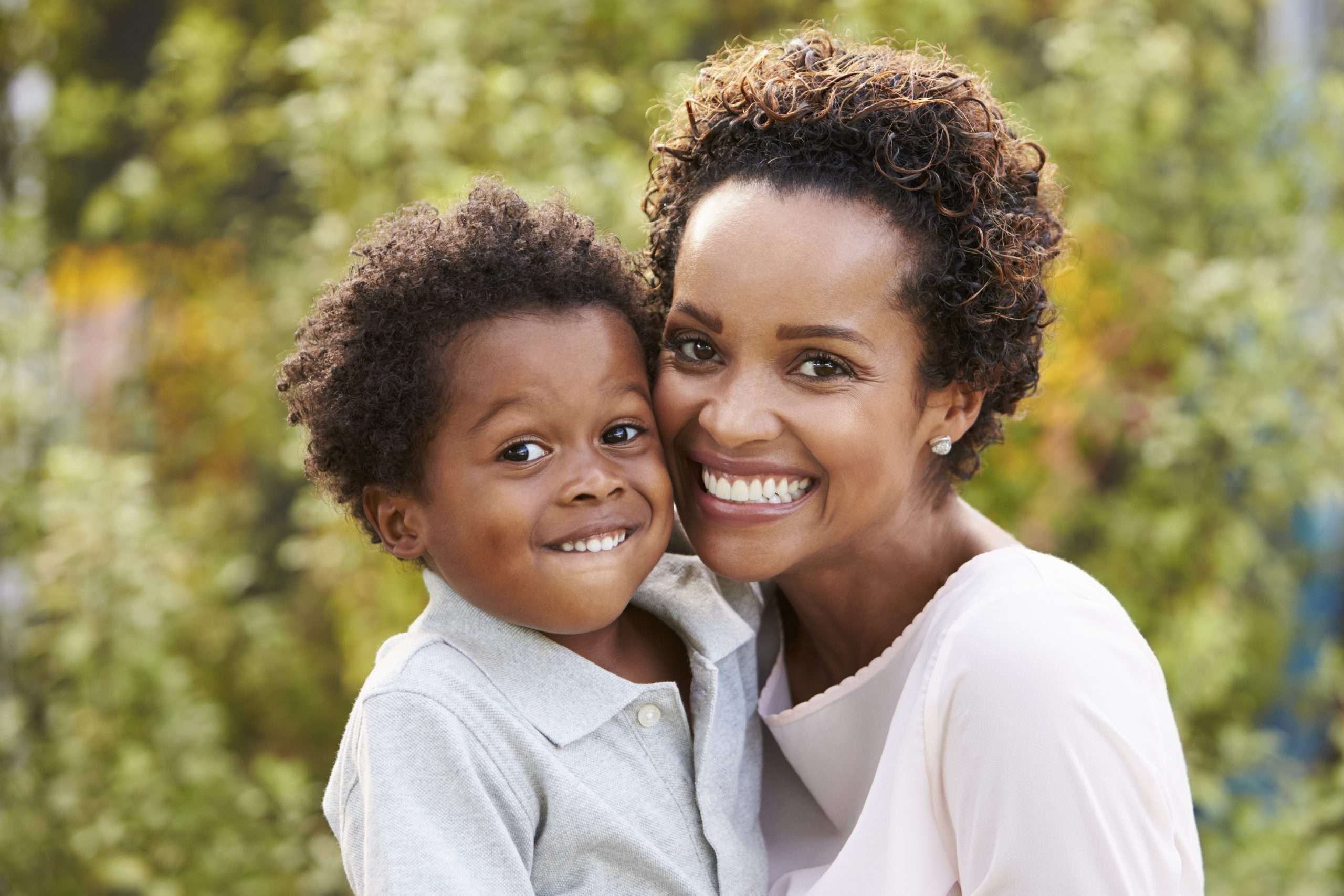 Black mom with her child smiling