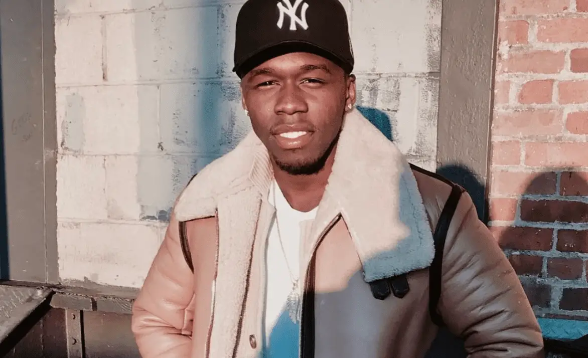 Picture of 50 cents son Marquise Jackson in a coat and New York hat