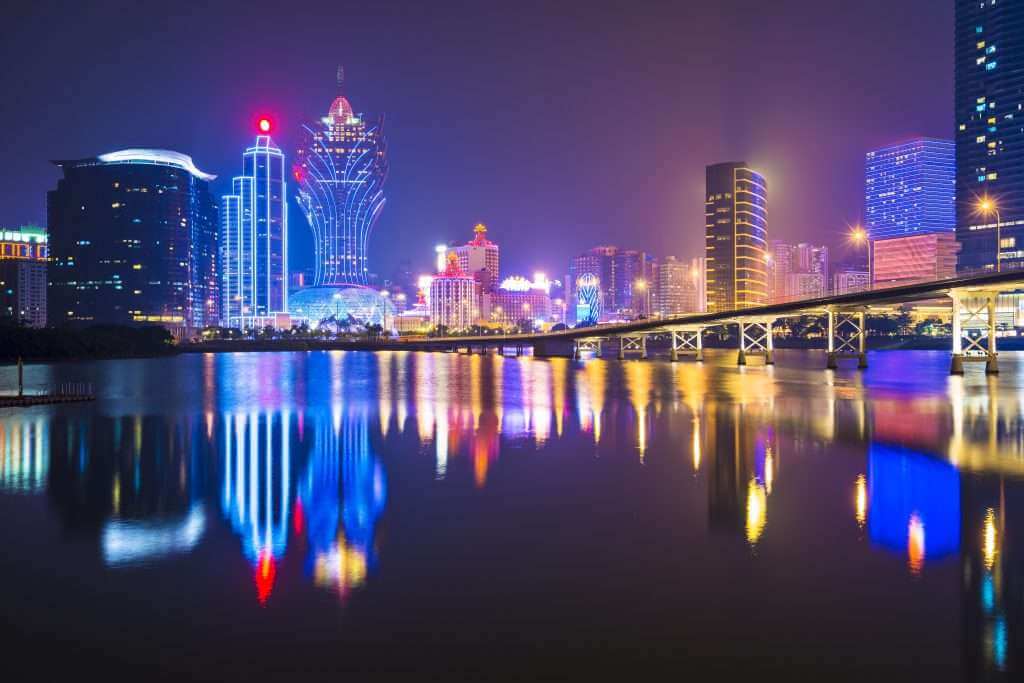 China Macau skyline at night with casinos 