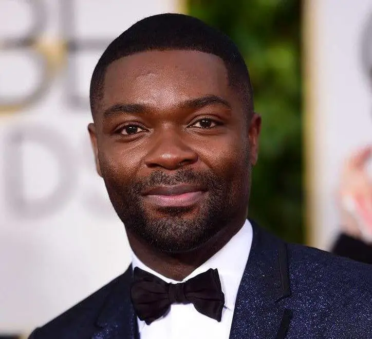 black british actor David Oyelowo at the Golden Globes in a shinny suit