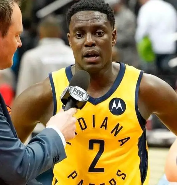 Jehovah witness NBA player Darren collison in Indian pacers jersey being interviewed