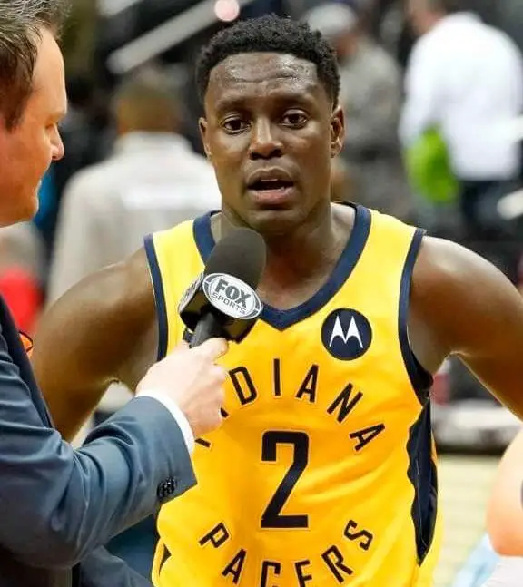 Jehovah witness NBA player Darren collison in Indian pacers jersey being interviewed