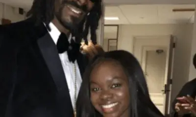 Snoop Dogs only Daughter Cori Brodus smiling at event