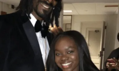 Snoop Dogs only Daughter Cori Brodus smiling at event