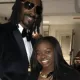 Snoop Dogs only Daughter Cori Brodus smiling at event