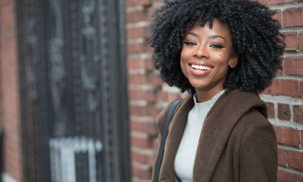 smiling african american woman with afro
