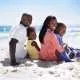 Black family by the beach